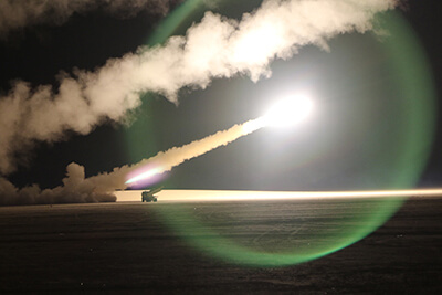 Soldiers with the Wyoming Army National Guard’s 115th Field Artillery Brigade fire rocket-propelled rounds from a truck during an exercise with Kuwait Land Forces at Udairi Range Complex, Kuwait, Feb. 10.
